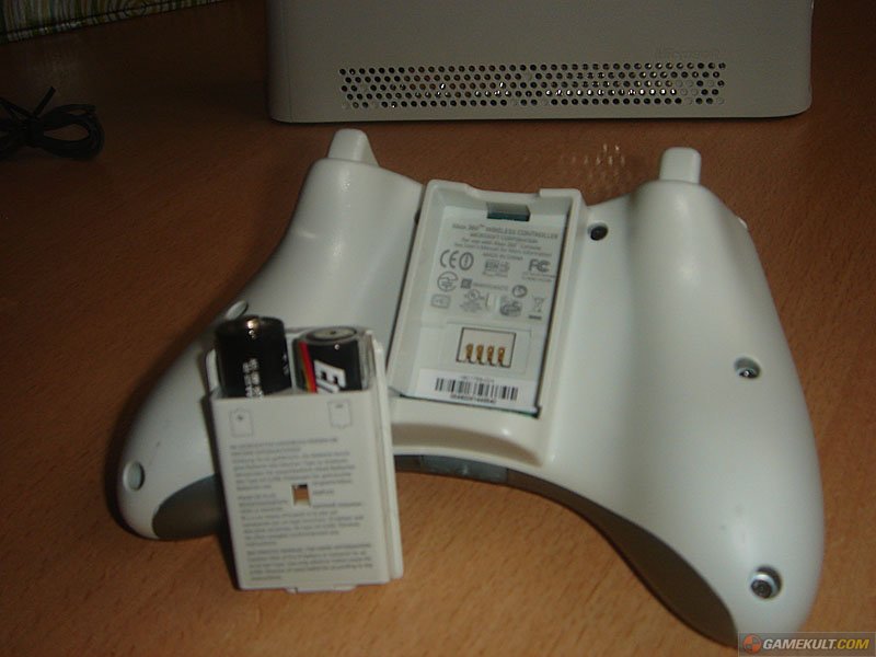 De draadloze controller met batterijen